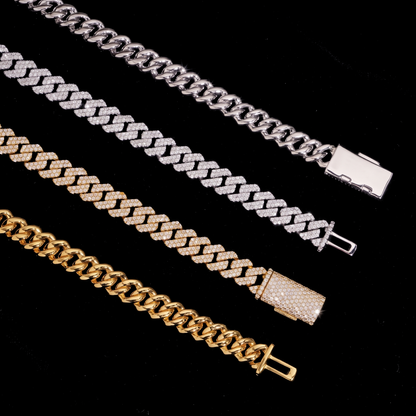 Cuban link detail showing prong set moissanite rows in silver and gold