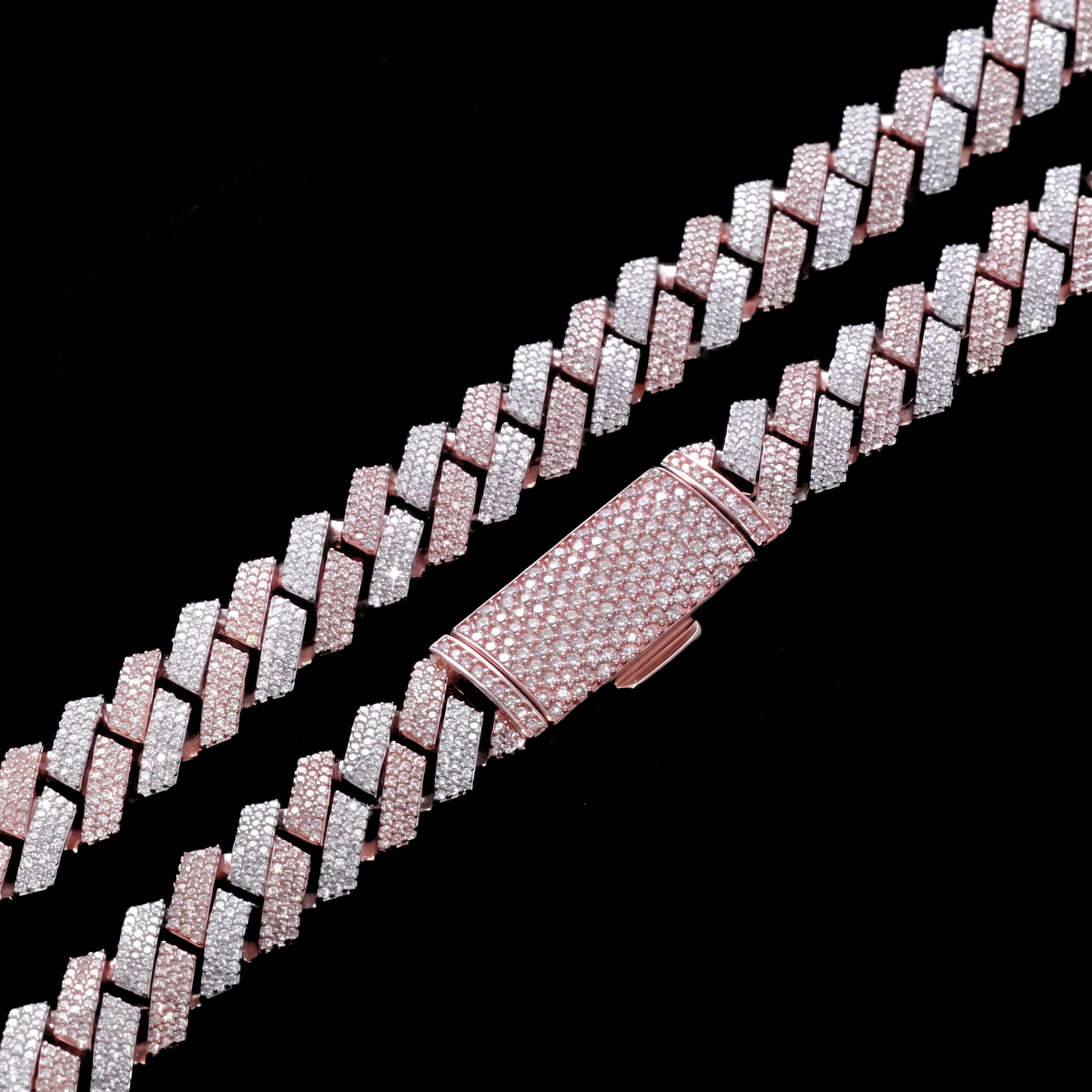 Two tone rose gold Cuban link chains draped on black velvet