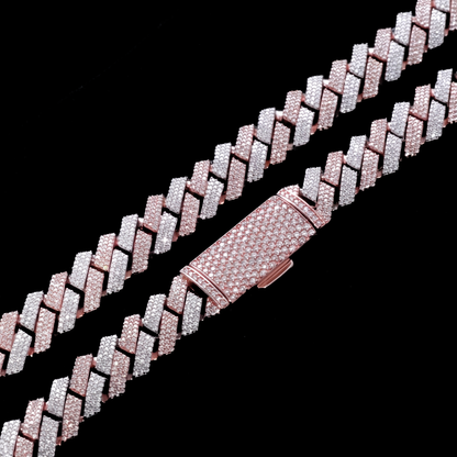 Two tone rose gold Cuban link chains draped on black velvet