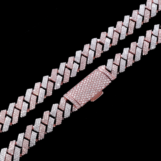 Two tone rose gold Cuban link chains draped on black velvet
