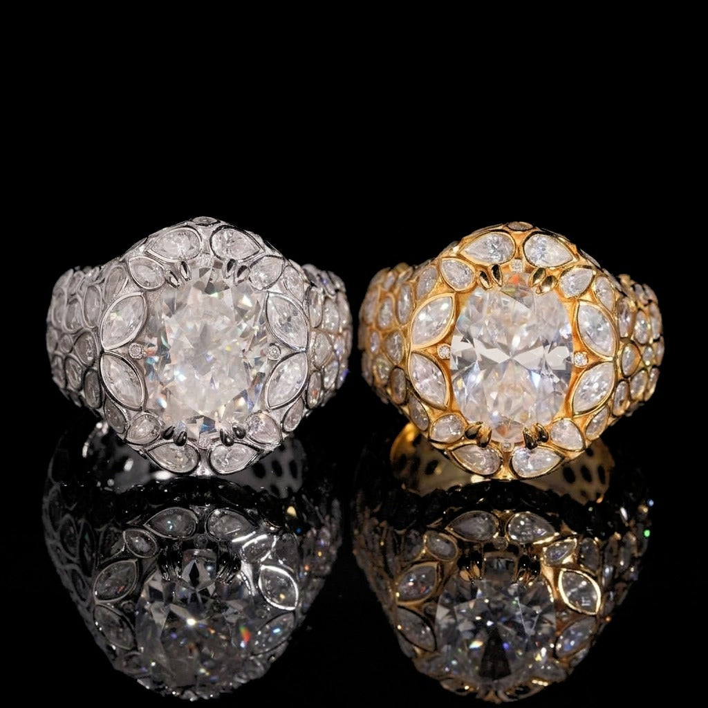 FULL BLOOM oval moissanite rings in silver and gold side by side on black