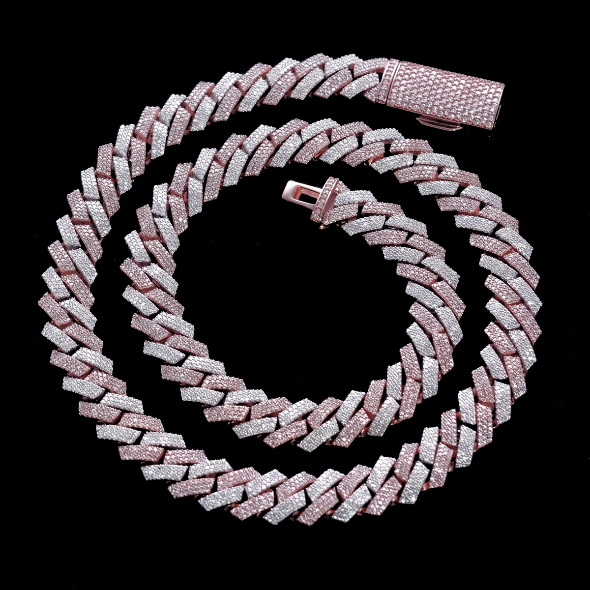 ROSE FROST 12mm two tone rose gold Cuban link chain coiled on black velvet