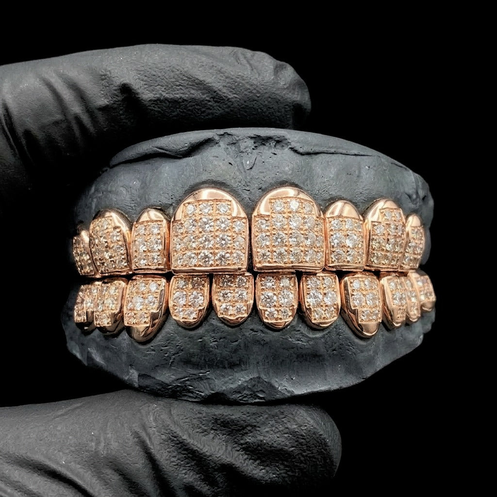 Angled view of custom fit 8x8 moissanite grillz in rose gold over 925 silver