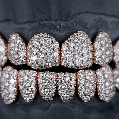 Macro close up of VVS moissanite honeycomb pave on rose gold plated 925 silver grillz caps