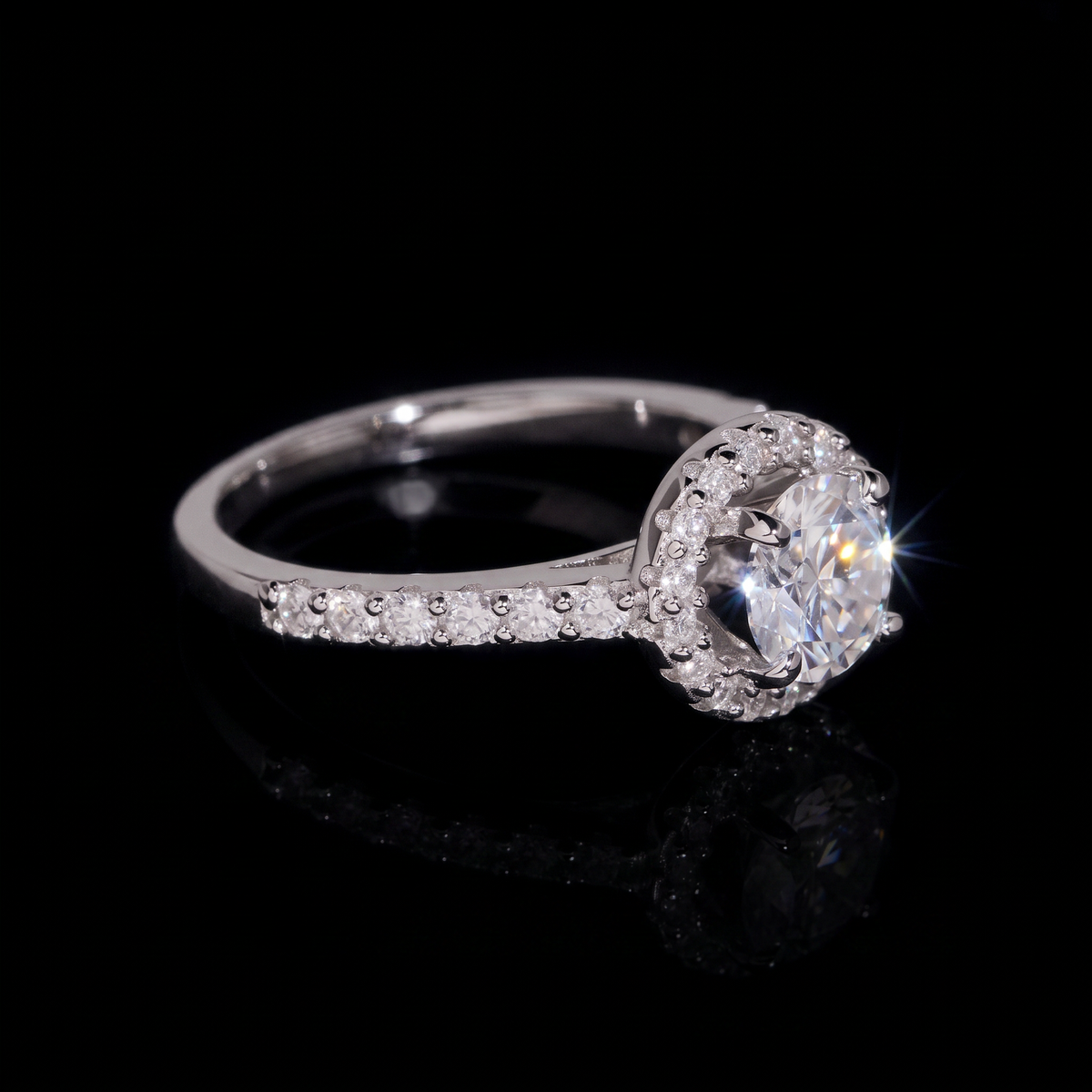 Halo moissanite engagement ring side angle showing pave shoulders