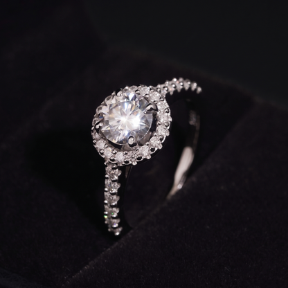 Close up of the 1 carat round brilliant moissanite center stone and halo