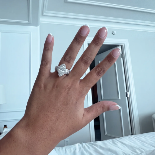 Marquise cut moissanite ring worn on a hand, showing how wide the center stone sits on the finger