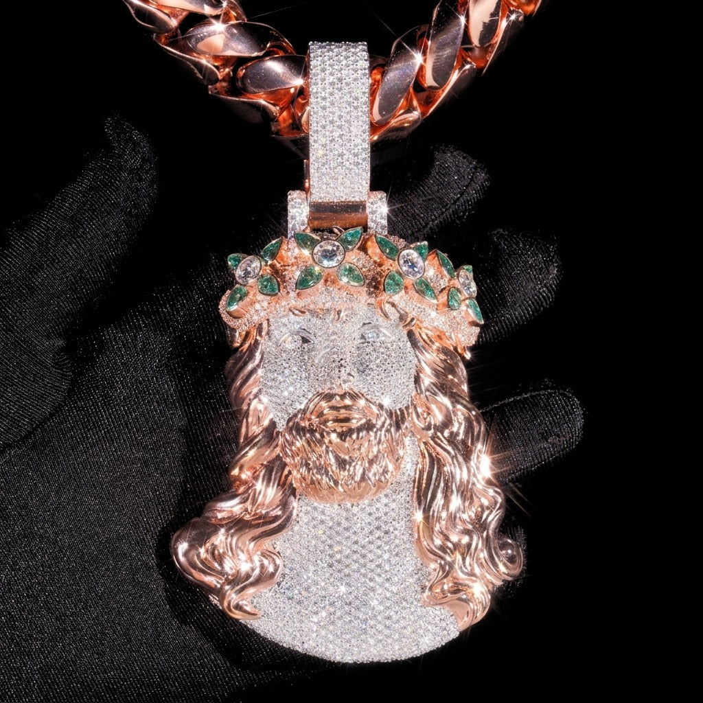 Close detail of 5 inch two tone rose gold moissanite Jesus pendant with green marquise crown