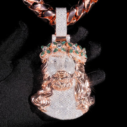 Close detail of 5 inch two tone rose gold moissanite Jesus pendant with green marquise crown