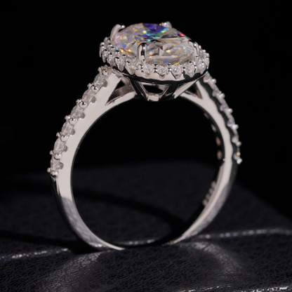 Oval moissanite ring showing rainbow fire in the stone