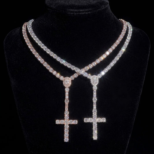 THE ROSARY moissanite cross tennis chain in silver and rose gold on black velvet display bust