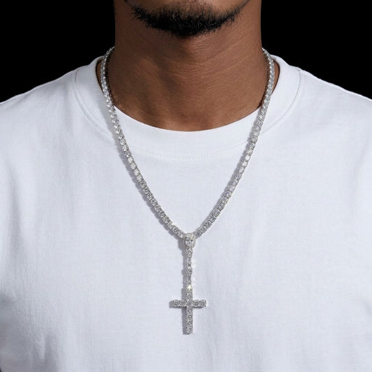 Man in white t shirt wearing THE ROSARY moissanite cross tennis chain in 925 silver