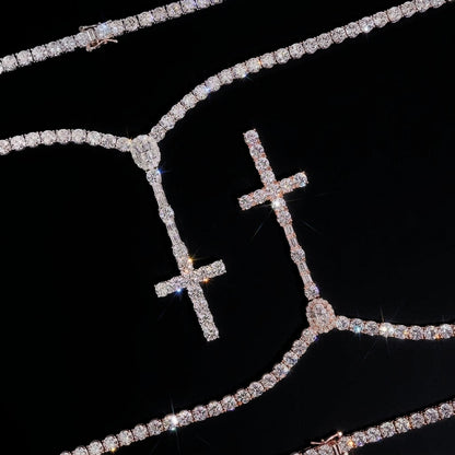 Close detail of moissanite rosary tennis chain cross pendants showing prong set stones