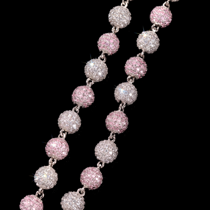 Close up of pink and white micro set simulated diamond beads on the 8mm ball chain