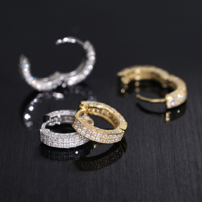 Detail of the two pave rows and milgrain edging on the moissanite huggie hoops
