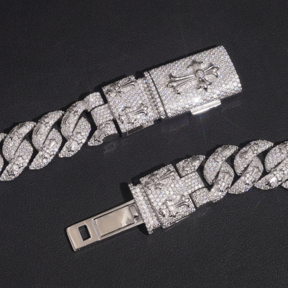 Close up of iced gothic cross box clasp on 18mm moissanite cuban link chain in 925 silver